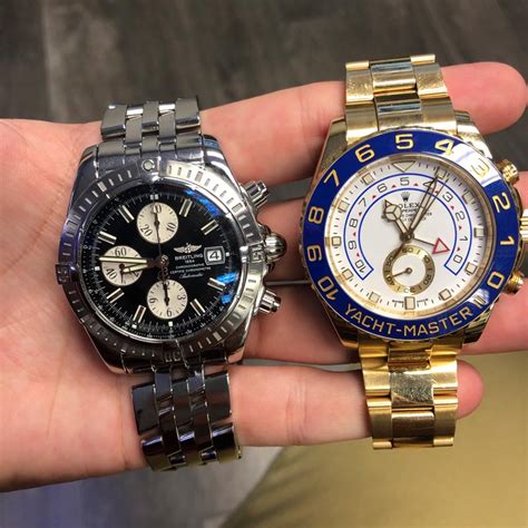 rolex vs breitling watch.